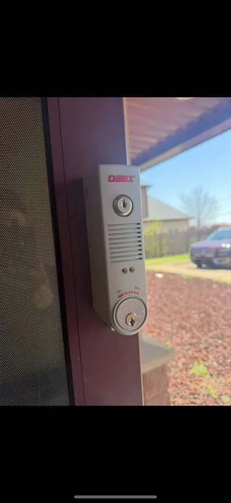 Detex exit device installed on a commercial door by Locksmith Solutions OKC